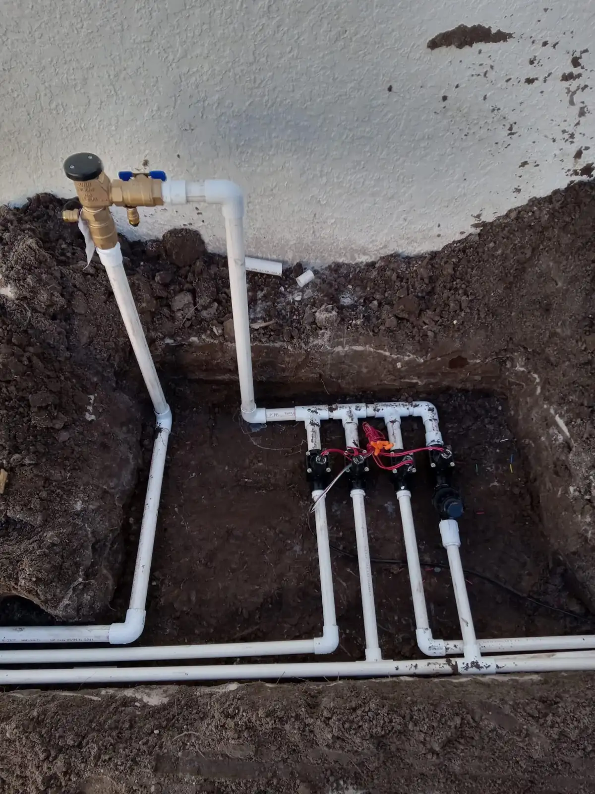 Landscape drainage components being planned around a yard