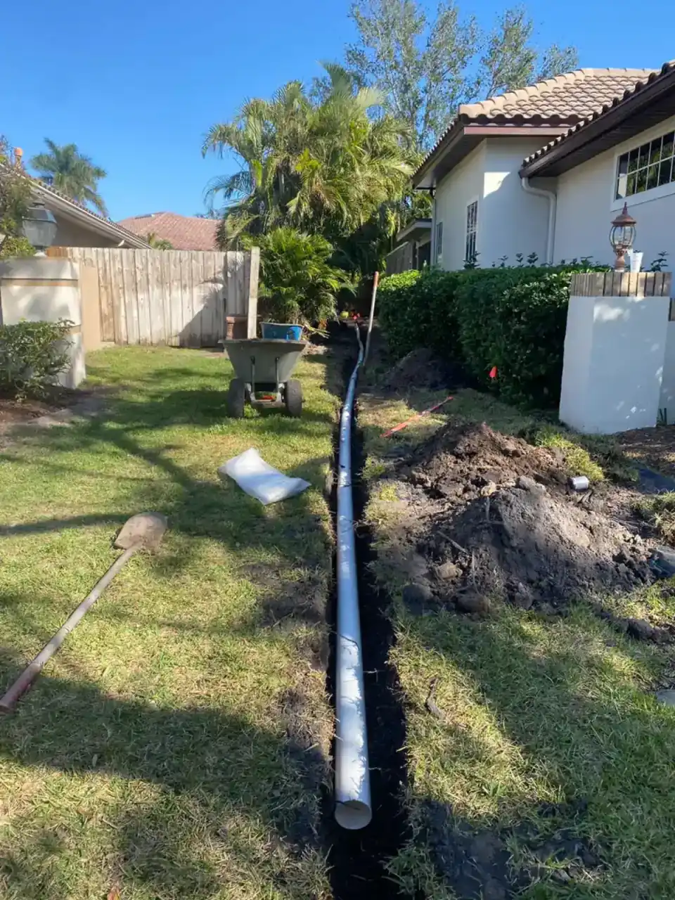 Drainage installation work in a residential landscape