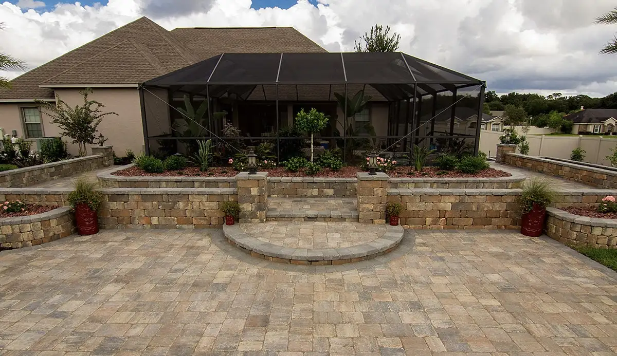 Paver patio construction with base and edge work visible